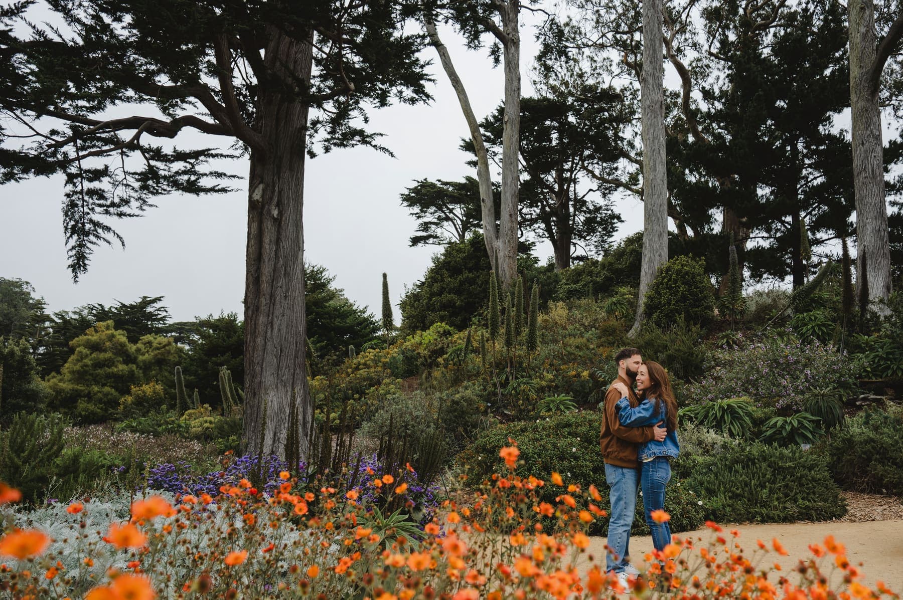 Rebecca and Shawn laughing together in the gardens